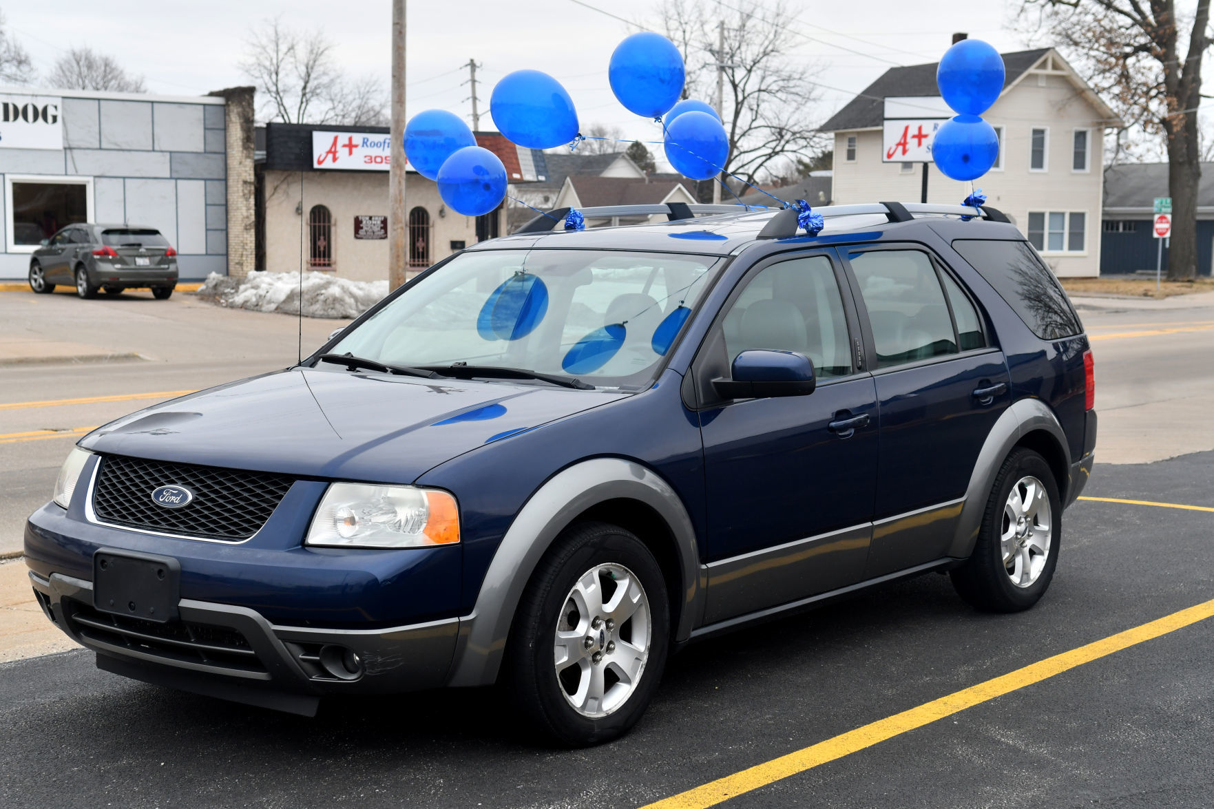 Moline police and Moline Municipal Credit Union give car away